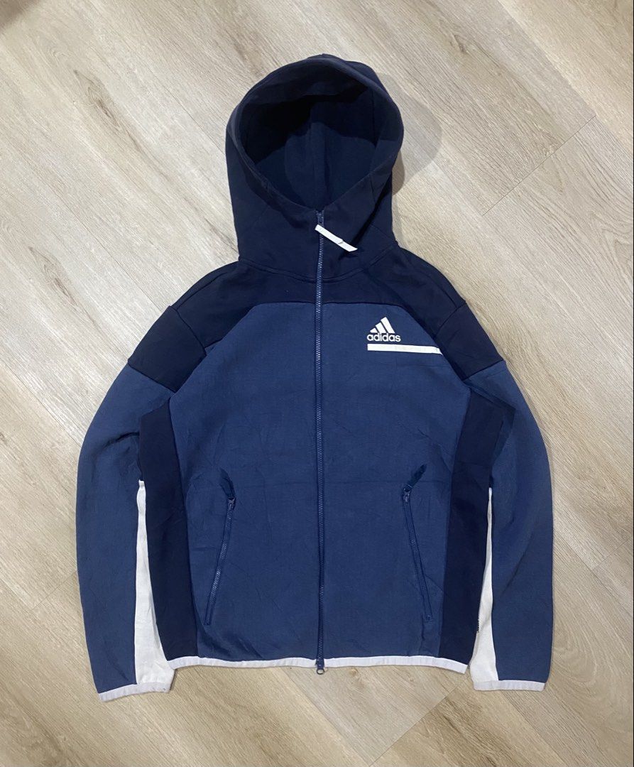 Adidas Z.N.E. Full-Zip Hoodie (Category: Activewear) located in Binan City. Submitted by apawan31 (Listing ID 1449223964, Image 2). Description: For sale: Adidas Z.N.E. Full-Zip Hoodie Size Large on tag Dimensions: 23W x 27L Excellent Condition Minimal issue: kumalat yung print sa wrist banda check last pic di naman halata pag suot kasi nakatago yung part nayon ₱600+sf Pm nalang po sa interested Location:Biñan City, Laguna Mop:Gcash & AUB Courier