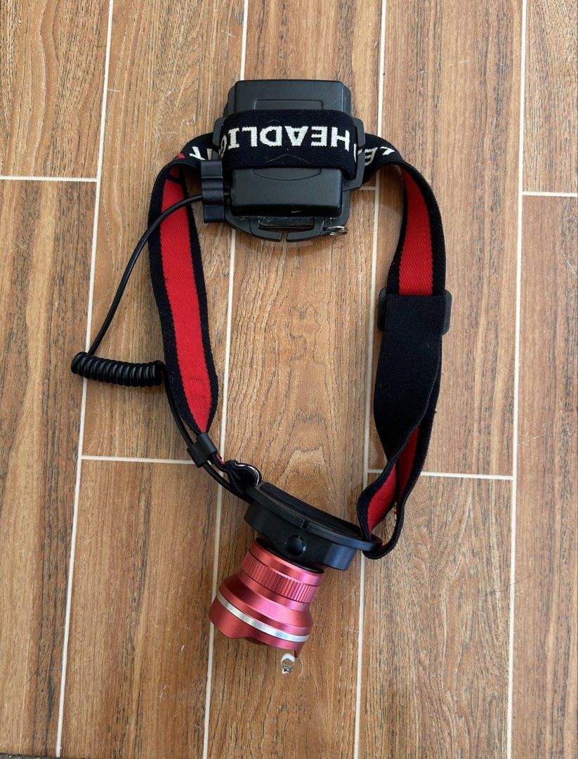 Adjustable LED Headlamp with Red and Black Strap (Category: Hiking & Camping) located in Cagayan de Oro. Submitted by aljay02 (Listing ID 1449148121, Image 2). Description: - Bright LED headlamp - Adjustable strap for comfortable fit - Angled beam for directed light - Perfect for outdoor activities & low-light work - Battery-powered - Ready for your next adventure!.