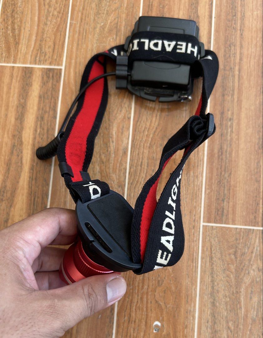 Adjustable LED Headlamp with Red and Black Strap (Category: Hiking & Camping) located in Cagayan de Oro. Submitted by aljay02 (Listing ID 1449148121, Image 3). Description: - Bright LED headlamp - Adjustable strap for comfortable fit - Angled beam for directed light - Perfect for outdoor activities & low-light work - Battery-powered - Ready for your next adventure!.