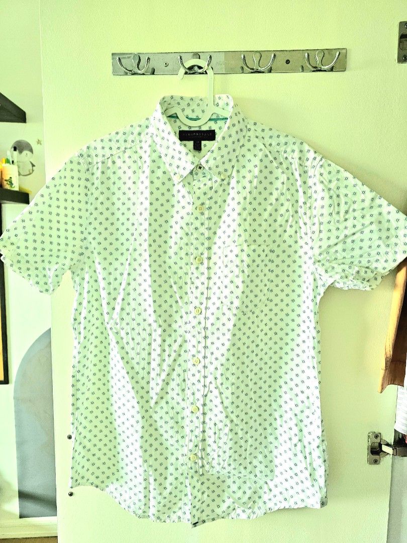 Aeropostale Short Sleeve Shirt (Category: Tshirts & Polo Shirts ) located in Quezon City. Submitted by dbjhub (Listing ID 1432891521, Image 1). Description: - Aeropostale short sleeve shirt - Unique teal pattern on white - Button-down style - Collared neckline - Classic fit - Perfect for casual wear.