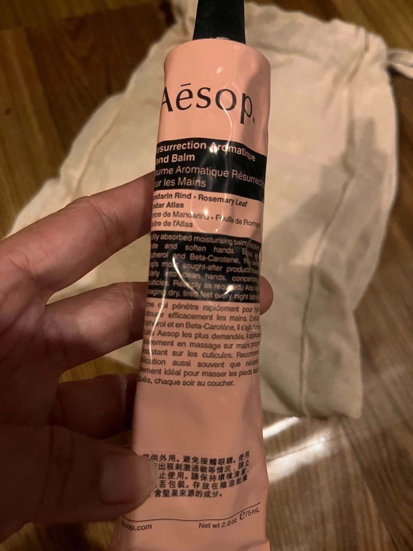 Aesop Resurrection Aromatique Hand Balm 75ml (Category: Hands & Nails) located in Iloilo. Submitted by wanderzee (Listing ID 1449191452, Image 2). Description: - Aesop Resurrection Aromatique Hand Balm - 75ml tube - Includes a drawstring pouch - Ideal for dry hands - Absorbs quickly for a non-greasy feel - Leaves hands feeling soft and hydrated - Features a refreshing citrus and woody aroma -Personally purchased in Aesop store in HK.