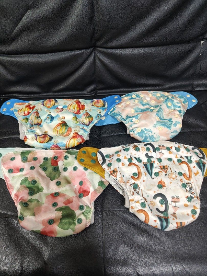 Aimerie Reusable Cloth Diapers with Inserts (Category: Diapers & Baby Wipes) located in Manila. Submitted by tadeoea20213649 (Listing ID 1449191737, Image 2). Description: 🌿Aimerie Reusable Cloth Diaper Set with Inserts 🌿 Orig Price : P1,700 Selling Price: P1,000 🍼 Preloved but well-maintained cloth diapers – perfect for eco-conscious parents! ✨ Includes: 4 adjustable snap cloth diapers (cute assorted designs) 4 absorbent microfiber/charcoal i