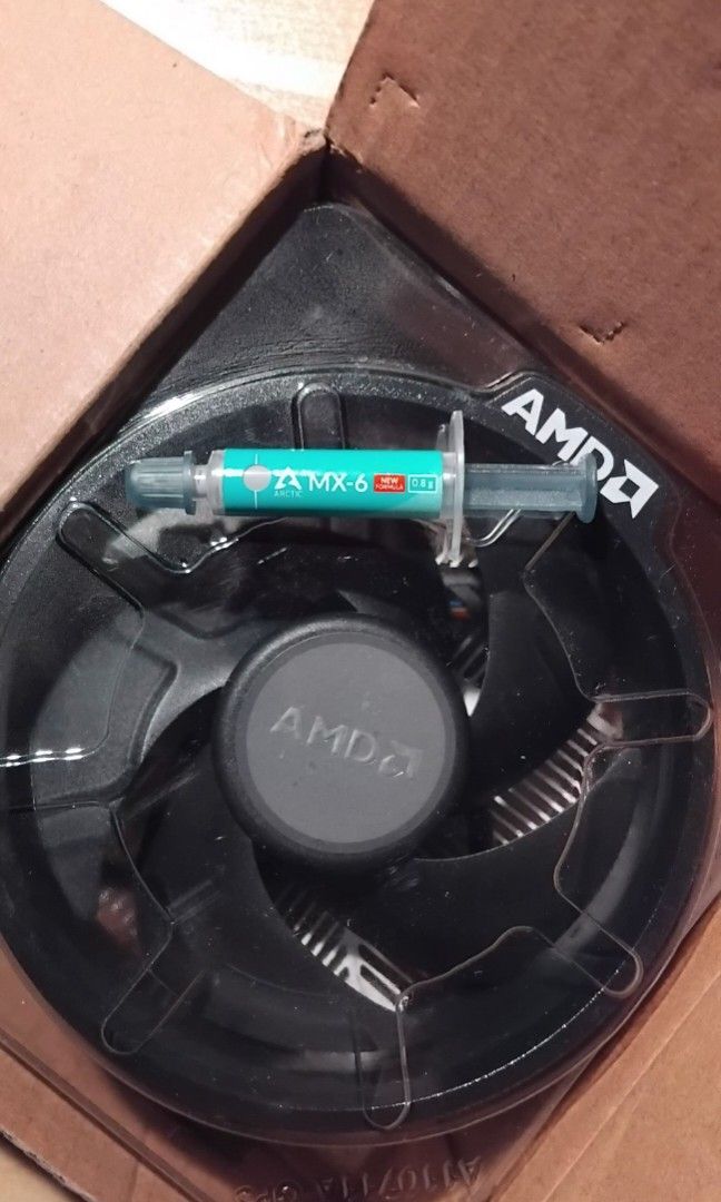 AMD Wraith Stealth CPU Stock Cooler + Arctic MX-6 Thermal Paste (Category: Computer Parts) located in Mandaluyong City. Submitted by passthetreasure (Listing ID 1449316221, Image 1). Description: • Thermal Paste was accidentally smeared 🫠 • Includes an Arctic MX-6 Thermal Paste.
