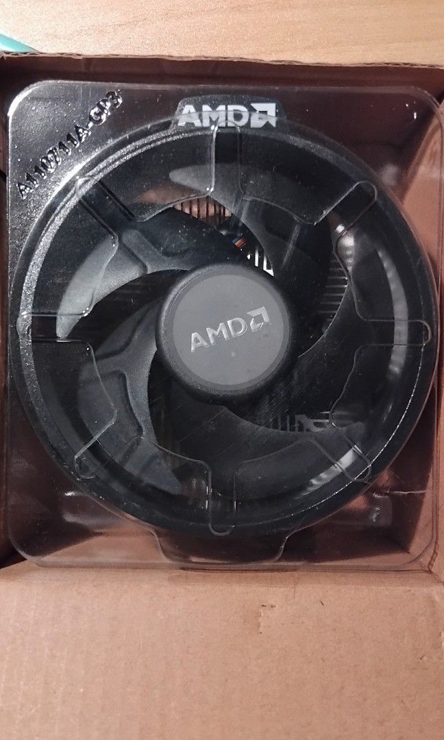 AMD Wraith Stealth CPU Stock Cooler + Arctic MX-6 Thermal Paste (Category: Computer Parts) located in Mandaluyong City. Submitted by passthetreasure (Listing ID 1449316221, Image 2). Description: • Thermal Paste was accidentally smeared 🫠 • Includes an Arctic MX-6 Thermal Paste.