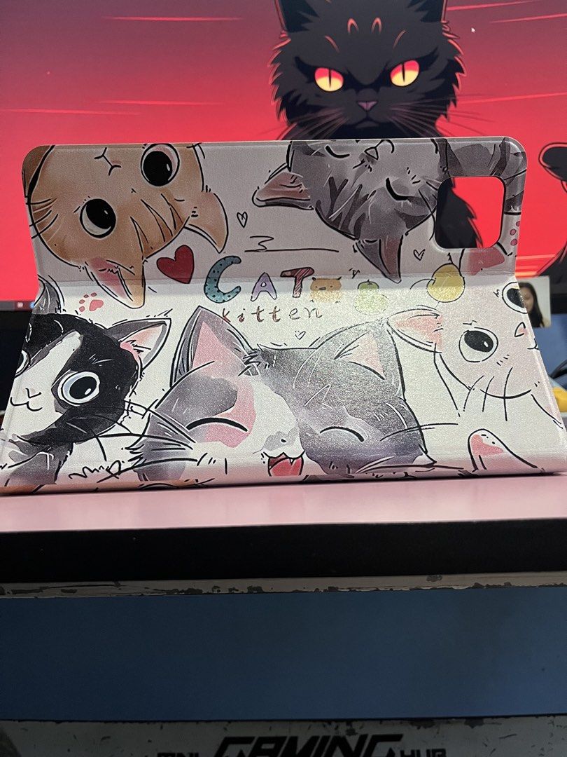 Android tablet case kitten/cat (Category: Cases & Sleeves) located in Caloocan City. Submitted by reign.piaa (Listing ID 1449111704, Image 2). Description: - Cat obsessed ipad/tablet case - 6.5inch width & length 10 inch • 📸 Message for more pics • ♻️ Prices are negotiable:) • 📦 Shipping fee will be shouldered by the buyer— J&T/Lalamove. Don’t hesitate to message me & ask for a follow up questions!😉.