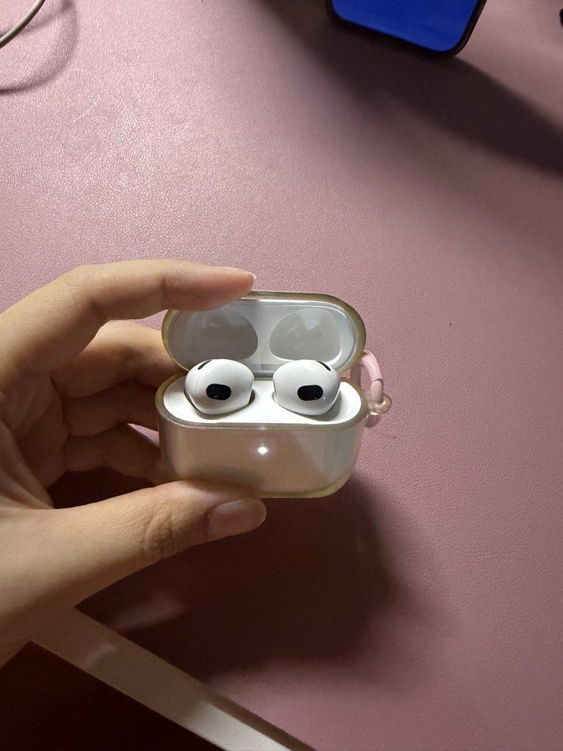 Apple AirPods 3rd Generation with Case (Category: Earphones) located in Makati City. Submitted by lshops (Listing ID 1449235110, Image 2). Description: - ORIGINAL AirPods 3rd Generation - Includes clear protective case - No box - havent connected in a year. Feel free to restart - RFS: not being used anymore.