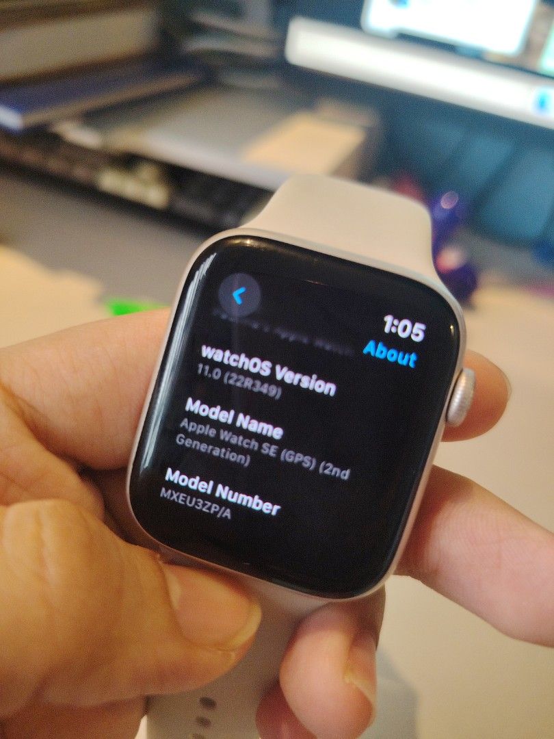 Apple Watch SE 4MM Silver Aluminum Case (Category: Wearables & Smart Watches) located in San Pablo. Submitted by przpl (Listing ID 1449147873, Image 3). Description: - Apple Watch SE - Silver aluminum case - Light beige sport band - Screen is on and shows passcode prompt - Back features Apple logo and watch details - Ready for a new owner.