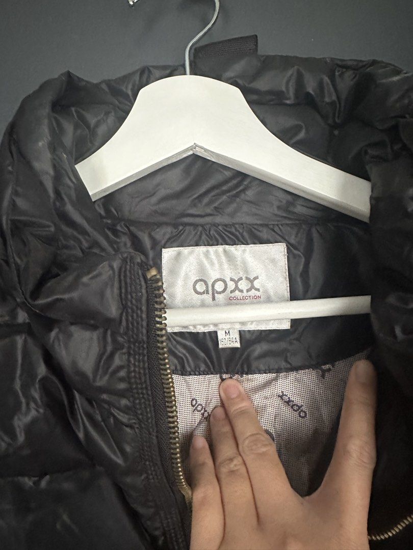 apxx Collection Black Puffer Jacket Size M (Category: Coats, Jackets and Outerwear) located in Cavite. Submitted by Ersdecluts (Listing ID 1449107718, Image 2). Description: - APXX Collection black puffer jacket - Size: Medium (M) - Full zip front closure - Stand-up collar - Elasticated cuffs and hem - Buckle details on cuffs and hem - Lightweight and warm material - Ideal for layering or standalone wear - Used once in Mt Fuji, bought in Ukay sto