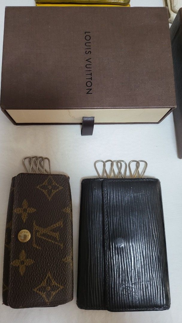 Authentic Bundle (Category: Luxury Bags & Wallets) located in Quezon City. Submitted by bonching (Listing ID 1449157635, Image 2). Description: - Bundle of designer accessories - Includes Trifold Balenciaga cardholders a - Louis Vuitton monogram key holder and Vernis - Miu Miu pink wallet and box - Prada white wallet - Comes with boxes and authenticity cards - Perfect for luxury accessory enthusiasts.