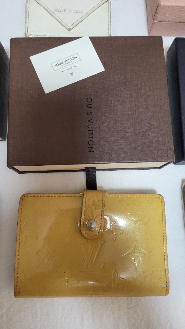 Authentic Bundle (Category: Luxury Bags & Wallets) located in Quezon City. Submitted by bonching (Listing ID 1449157635, Image 3). Description: - Bundle of designer accessories - Includes Trifold Balenciaga cardholders a - Louis Vuitton monogram key holder and Vernis - Miu Miu pink wallet and box - Prada white wallet - Comes with boxes and authenticity cards - Perfect for luxury accessory enthusiasts.