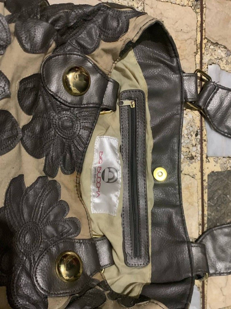 Vintage Bag | Big Buddha (Category: Luxury Bags & Wallets) located in Manila. Submitted by daniel7584 (Listing ID 1449292148, Image 3). Description: Fabulous new spring style are Just arrived is Big Buddha’s 2012 Santa Barbara Hand bag in Gunmetal. Beautiful & stunning. Specification: -Big storage can fit (laptop) -Extra Storage Outside Left & Right -Weight 1.3kg -Metallic Gold Chain Striking Beige background and Unique Floral Flower Design. Stil