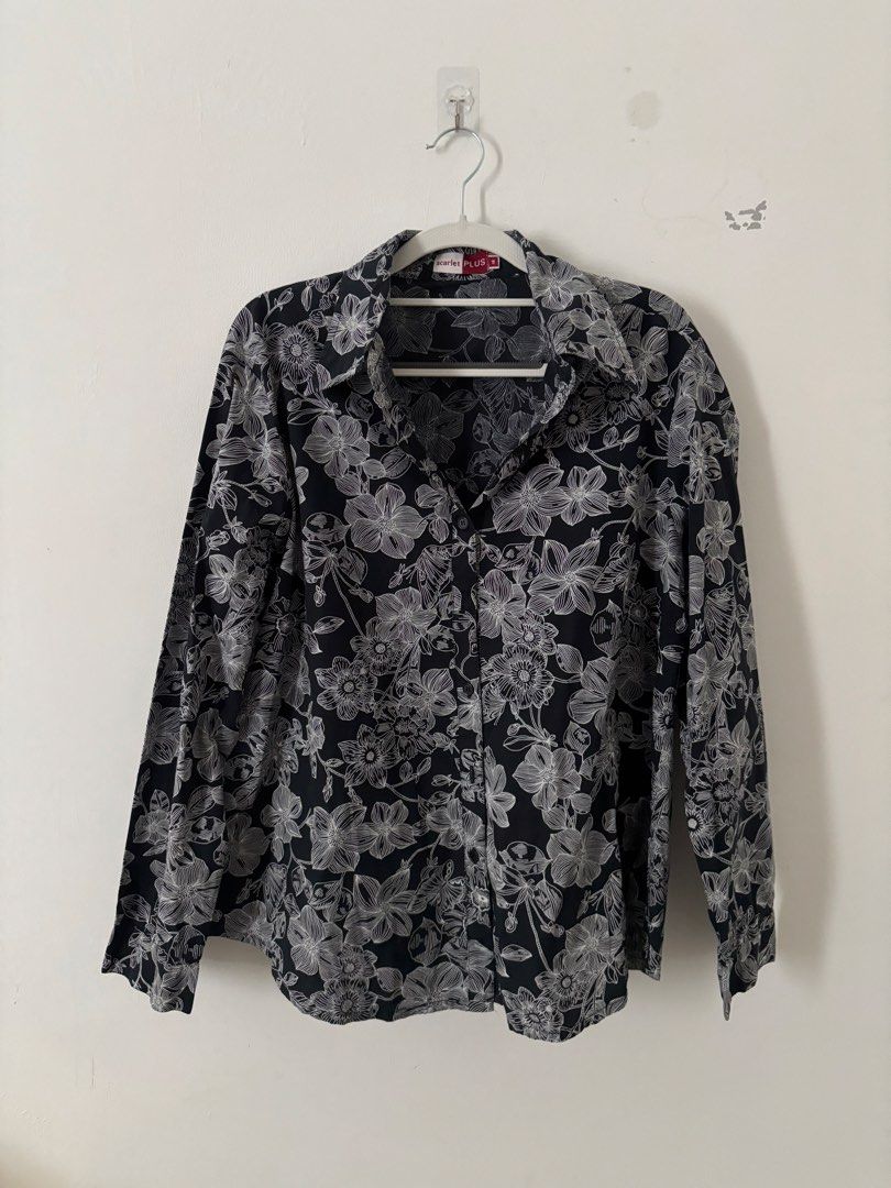 Black Floral Long Sleeve Button-Up Shirt (Category: Longsleeves) located in Kuala Lumpur. Submitted by jkhgfdcj (Listing ID 1449124124, Image 1). Description: - Black long sleeve shirt - White floral print - Button-up front - Classic collar - Versatile for casual or dressed-up occasions - Pairs well with jeans or trousers.