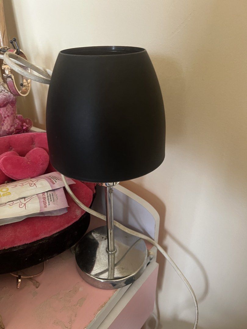 Black Matte Finish Desk Lamp with Chrome Base (Category: Lighting) located in Santa Rosa. Submitted by wilmabhernandez-21945 (Listing ID 1449238511, Image 1). Description: - Stylish black desk lamp - Matte finish shade - Shiny chrome base - Perfect for bedside tables or desks - Works well and includes cord.