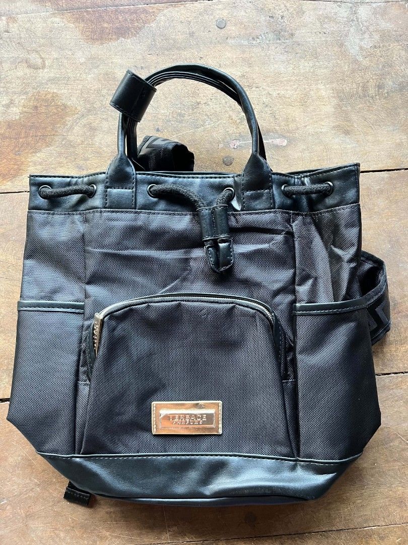 Black nylon Versace Parfums backpack (Category: Luxury Bags & Wallets) located in General Santos City (Dadiangas). Submitted by charles1.0 (Listing ID 1449210539, Image 2). Description: Dm me for details.