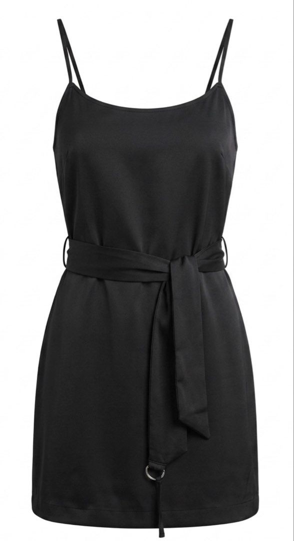 Black Spaghetti Strap Dress with Belt (Category: Dresses) located in San Juan City. Submitted by Goodstuffhere (Listing ID 1449120943, Image 1). Description: - Elegant black slip dress - Adjustable spaghetti straps for a perfect fit - Includes a matching fabric belt with a unique metal ring detail - Belt ties at the waist for a customizable silhouette - Simple, chic, and incredibly versatile - Ideal for layering over or under other pieces, or wea