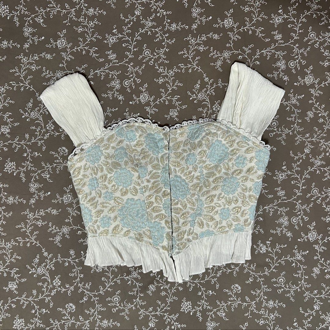 Blue Floral Corset Top (Category: Others Tops) located in Pasig City. Submitted by kricalin (Listing ID 1449174551, Image 1). Description: - Cute corset top with ruffled sleeves and hem - Used once for an event, good as new.