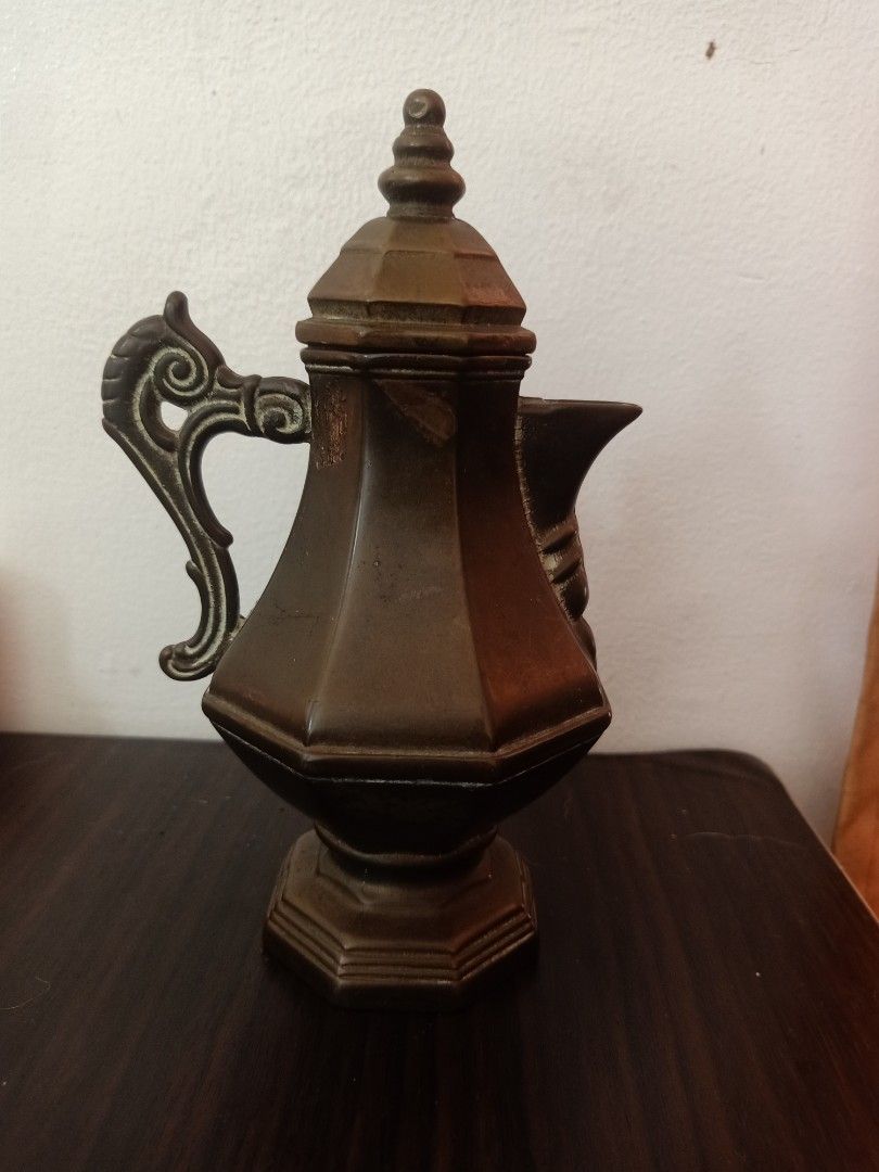 Bronze coffee pot (Category: Coffee & Tea Tableware) located in Las Pinas. Submitted by the_recycle_shop (Listing ID 1449136055, Image 1). Description: Antique vintage bronze material.