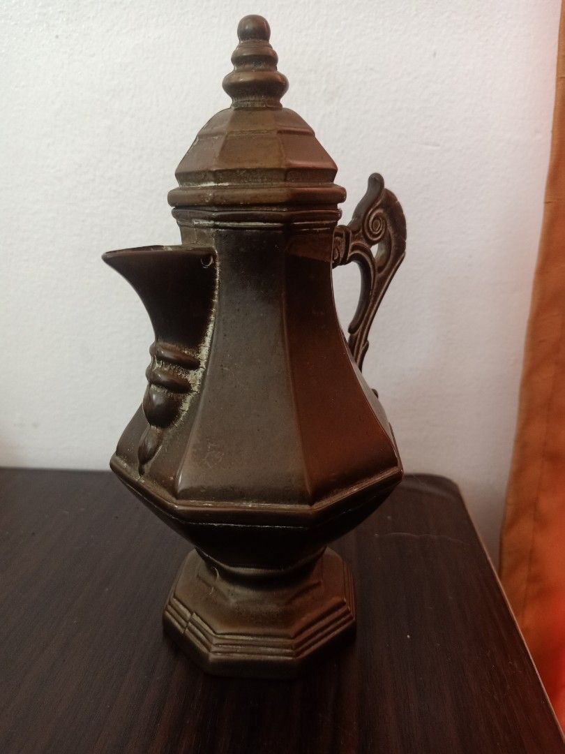 Bronze coffee pot (Category: Coffee & Tea Tableware) located in Las Pinas. Submitted by the_recycle_shop (Listing ID 1449136055, Image 2). Description: Antique vintage bronze material.