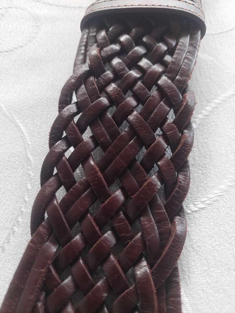 Brown Braided Cowhide Leather Belt for females with Silver Buckle (Category: Accessories) located in Kuala Lumpur. Submitted by genuinevintages (Listing ID 1449115898, Image 3). Description: - Brown braided leather belt - Decorative silver buckle - Loop closure - Textured woven leather - Approx. 38 inches long - Available for shipping in Malaysia.