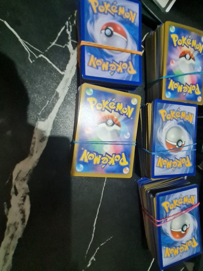 Bulk Pokemon Cards - Multiple Stacks Available (Category: Raw Singles) located in Quezon City. Submitted by declutter1990 (Listing ID 1449274116, Image 2). Description: 399 pesos for 300 pieces LOCATION NEAR MCDO KATIPUNAN MIX CARDS HINDI PO PWEDE PUMILI. SAME GOES IF U BUY IT FROM STORES HINDI MAKIKITA DONT ASK FOR PHOTOS OR VIDEOS OF FRONT PART OF CARDS MIX OF BLUE AND YELLOW ENGLISH AND NON ENGLISH WILL IGNORE ASKING FOR PICTURES OF FRONT ART 