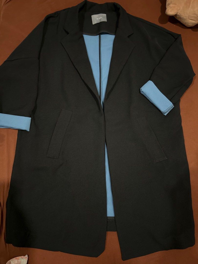 by.min Black Blazer with Blue Lining (Category: Coats, Jackets and Outerwear) located in Caloocan City. Submitted by declutterieee (Listing ID 1449260718, Image 2). Description: - BY.MIN black blazer - Contrasting bright blue lining - Cuffed sleeves revealing blue lining - Two front pockets - Ideal for layering and adding a sharp, stylish touch to any outfit.