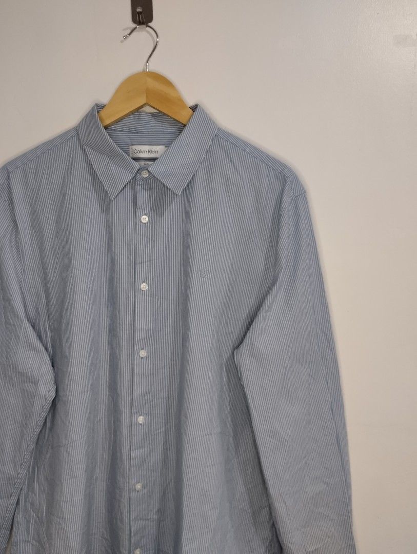 Calvin Klein Button Down (Category: Formal Shirts) located in Bago City. Submitted by classic_picked_up (Listing ID 1449160196, Image 2). Description: excellent no issue 22 by 29.5-30 9.5/10 color rate.