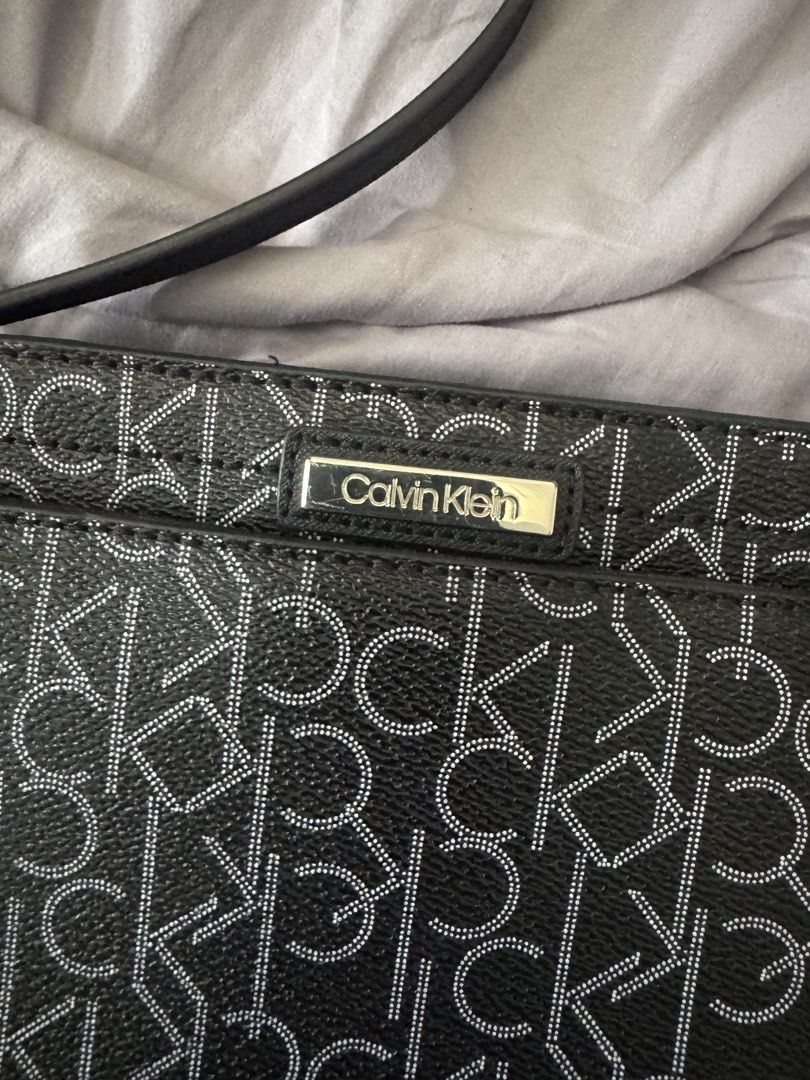 calvin klein monogram sling bag (Category: Cross-body Bags) located in Manila. Submitted by ecooo (Listing ID 1449187264, Image 2). Description: used like new unisex ingood conditiom.