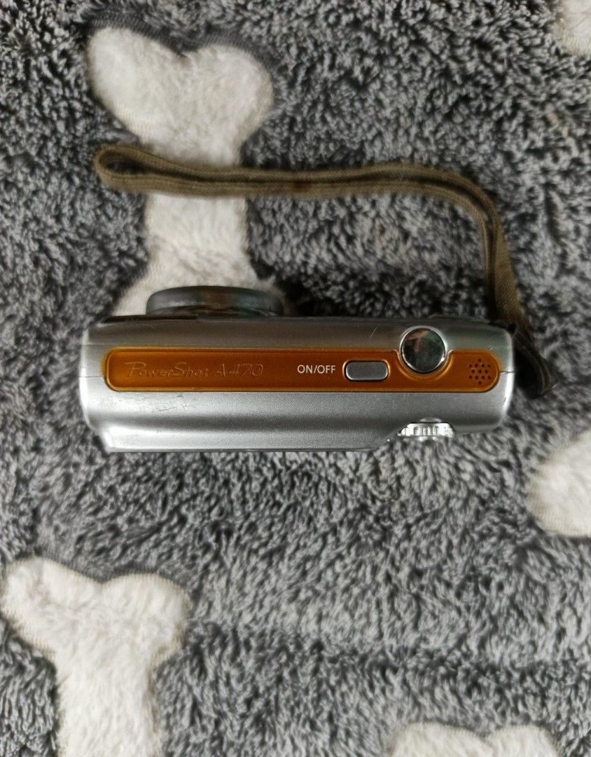 Canon PowerShot A470 Digital Camera (Category: Cameras) located in Mabalacat. Submitted by by.mo_nograph (Listing ID 1449284993, Image 2). Description: Free shipping! - Canon PowerShot A470 Digital Camera - 7.1 Megapixels - 3x Optical Zoom - Includes Wrist S trap - Tested and Working - Minor signs of wear on the body - Perfect for casual, simple point-and-shoot photography Issues: lcd burn overexposure sensor issue.