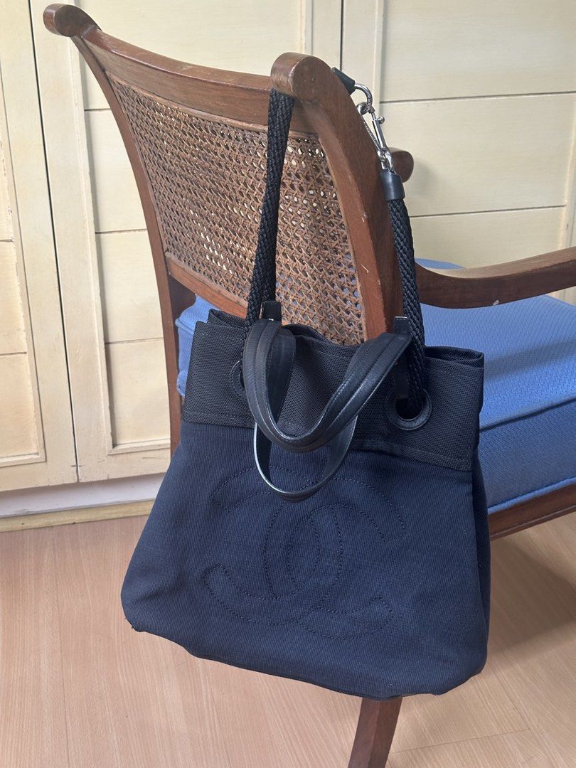 Chanel Denim Canvas Tote Bag (Category: Luxury Bags & Wallets) located in Mandaluyong City. Submitted by marceditems (Listing ID 1449207559, Image 2). Description: - Chanel tote bag - Denim canvas with iconic stitched CC logo - Genuine leather handles and trim - Interior zip pocket for essentials - Elegant silver hardware details - Series 13, Hologram intact - Authentically made in Italy.