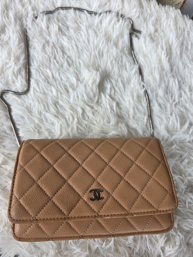 Chanel Wallet on Chain Beige Caviar Leather (Category: Luxury Bags & Wallets) located in Lemery. Submitted by venus23 (Listing ID 1449181332, Image 1). Description: - Beige Chanel WOC - Caviar leather - Classic diamond quilting - Silver hardware - Interior zip pocket and card slots - Ideal for essentials - Comes with a silver chain strap.