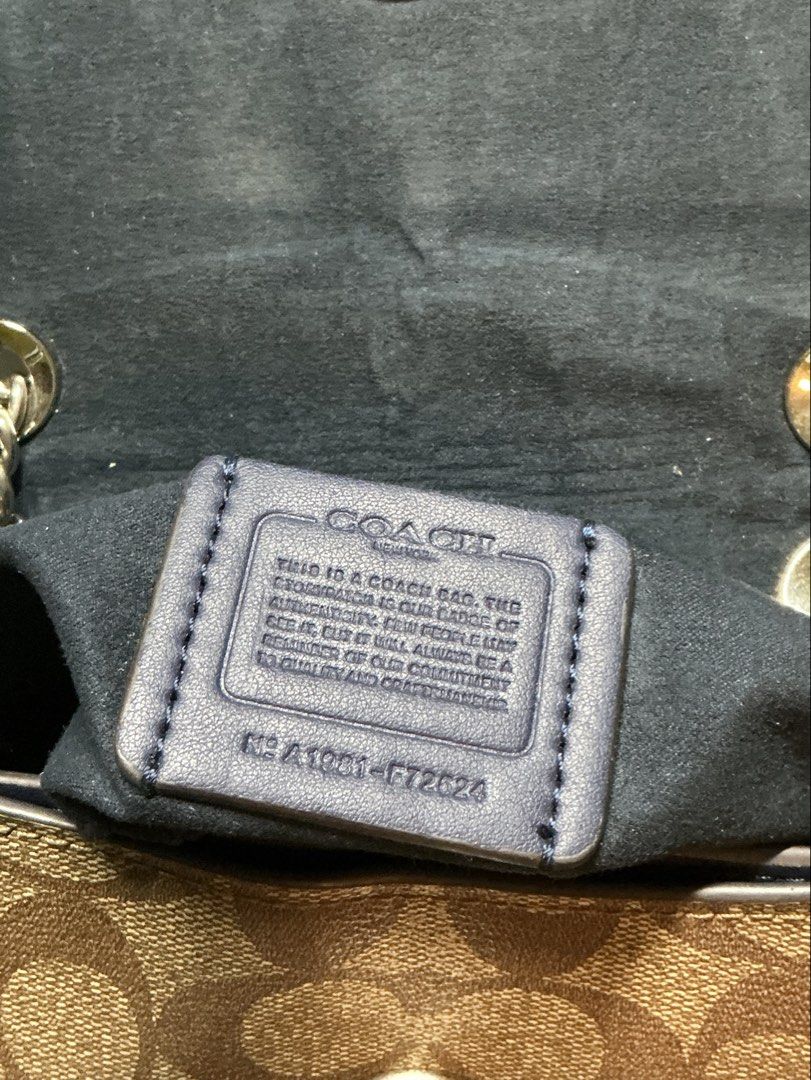 Coach Flower Turnlock Snake Print Sling bag (Category: Luxury Bags & Wallets) located in Manila. Submitted by eunoia67 (Listing ID 1449320342, Image 3). Description: - Coach shoulder bag - Signature print with light blue flap - Cute flower turnlock closure - Chain strap - Has flaws!!.