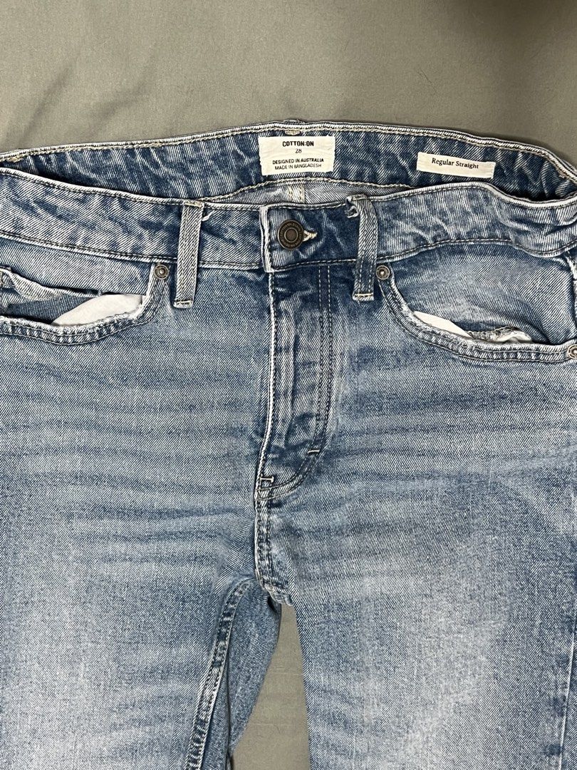 Cotton On Regular Straight Jeans Light Wash (28) (Category: Jeans) located in Quezon City. Submitted by carlSELL (Listing ID 1449217185, Image 2). Description: - Cotton On regular straight jeans size 28 - Light blue wash with a faded look - Button fly closure - Classic five-pocket styling - Versatile for everyday casual outfits.