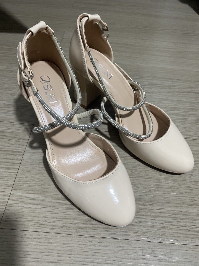 Cream Block Heels with Rhinestone Straps (Category: Heels) located in Mandaluyong City. Submitted by preLAVed (Listing ID 1449256677, Image 2). Description: - Cream colored block heels - Two sparkly rhinestone straps across the foot - Strap to secure feet while walking - Heel height: approximately 3-4 inches - Estimated size: 37 - Ideal for elevating any outfit.