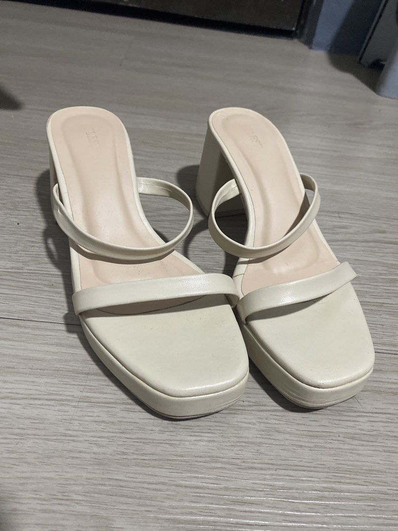 Cream Square Toe Block Heel Mules Sandals (Category: Flats & Sandals) located in Mandaluyong City. Submitted by preLAVed (Listing ID 1449257306, Image 1). Description: - Cream colored mules - Square toe design - Comfortable block heel - Two thin straps across the foot - Easy slip-on style - Versatile for dressing up or down.