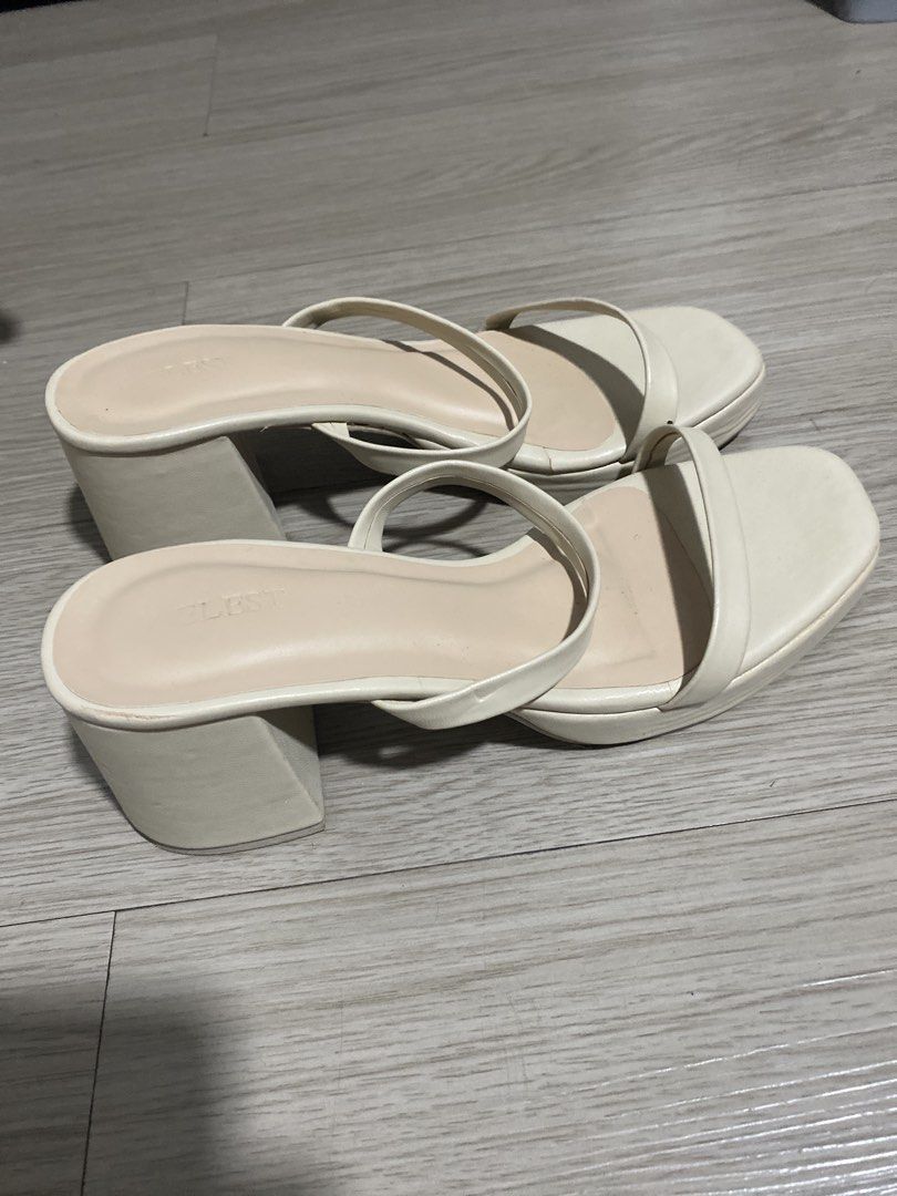 Cream Square Toe Block Heel Mules Sandals (Category: Flats & Sandals) located in Mandaluyong City. Submitted by preLAVed (Listing ID 1449257306, Image 2). Description: - Cream colored mules - Square toe design - Comfortable block heel - Two thin straps across the foot - Easy slip-on style - Versatile for dressing up or down.