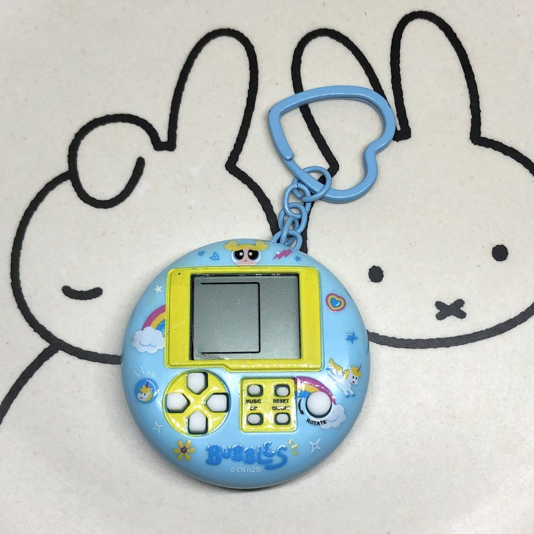 CREATIVE POWER PUFF GIRLS BUBBLES ELECTRONIC GAME KEYCHAIN (Category: Interactive Toys) located in Quezon City. Submitted by kitsune.treasures (Listing ID 1449212305, Image 2). Description: *First to pay policy! *1 day reservation only. Failure to pay on time, auto cancel. 📍Quezon City * MOD: J&T | Lalamove * MOP: GCASH | BPI 📦ON HAND AND READY TO SHIP! CONDITION: WHAT YOU SEE IS WHAT YOU GET. Dimensions: Kindly check the photos for the actual 