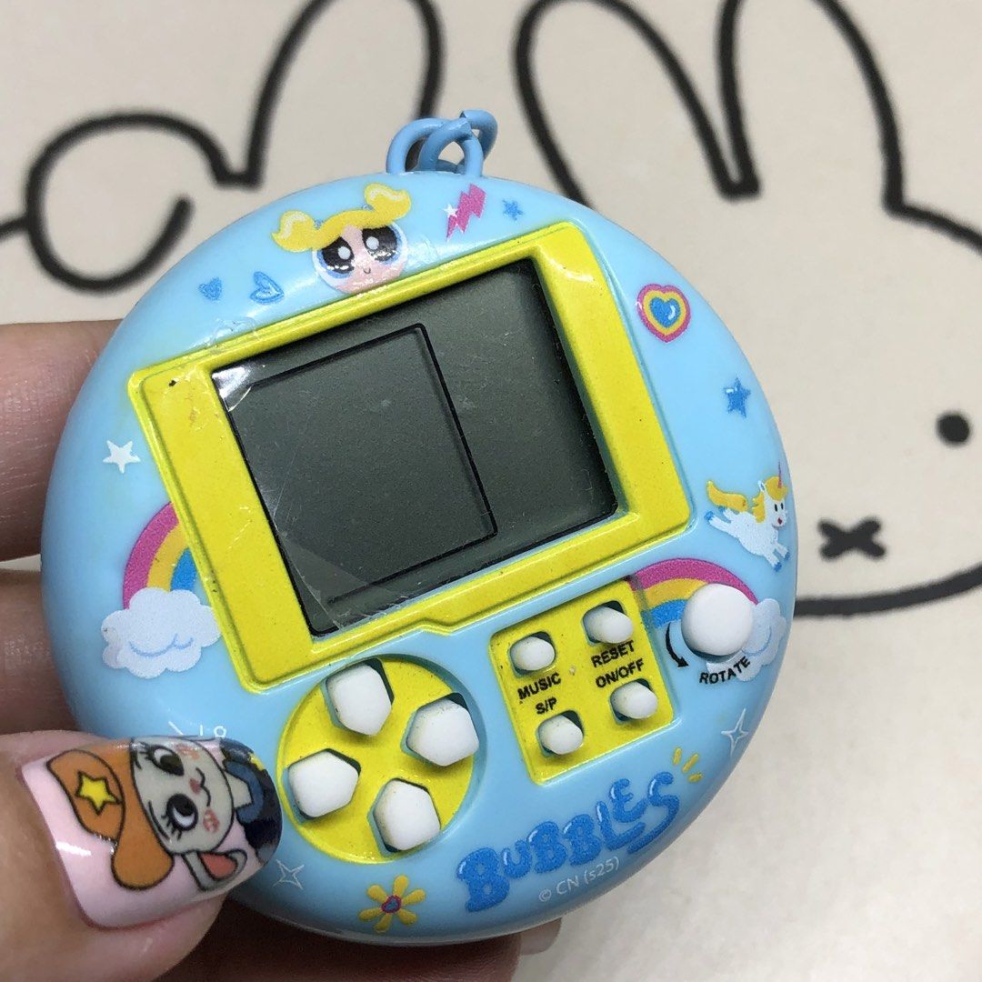 CREATIVE POWER PUFF GIRLS BUBBLES ELECTRONIC GAME KEYCHAIN (Category: Interactive Toys) located in Quezon City. Submitted by kitsune.treasures (Listing ID 1449212305, Image 3). Description: *First to pay policy! *1 day reservation only. Failure to pay on time, auto cancel. 📍Quezon City * MOD: J&T | Lalamove * MOP: GCASH | BPI 📦ON HAND AND READY TO SHIP! CONDITION: WHAT YOU SEE IS WHAT YOU GET. Dimensions: Kindly check the photos for the actual 