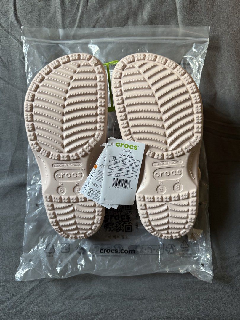 Crocs Classic Clogs (M6/W8) (Category: Slippers and slides) located in Angeles City. Submitted by decluttering.kimmmyyy (Listing ID 1449220165, Image 3). Description: Please see all details below: - Classic Crocs clogs - Color: Quartz - Size: M6/W8 - Condition: Brand new, still in original plastic packaging - Bought in US - RFS: extra pair.