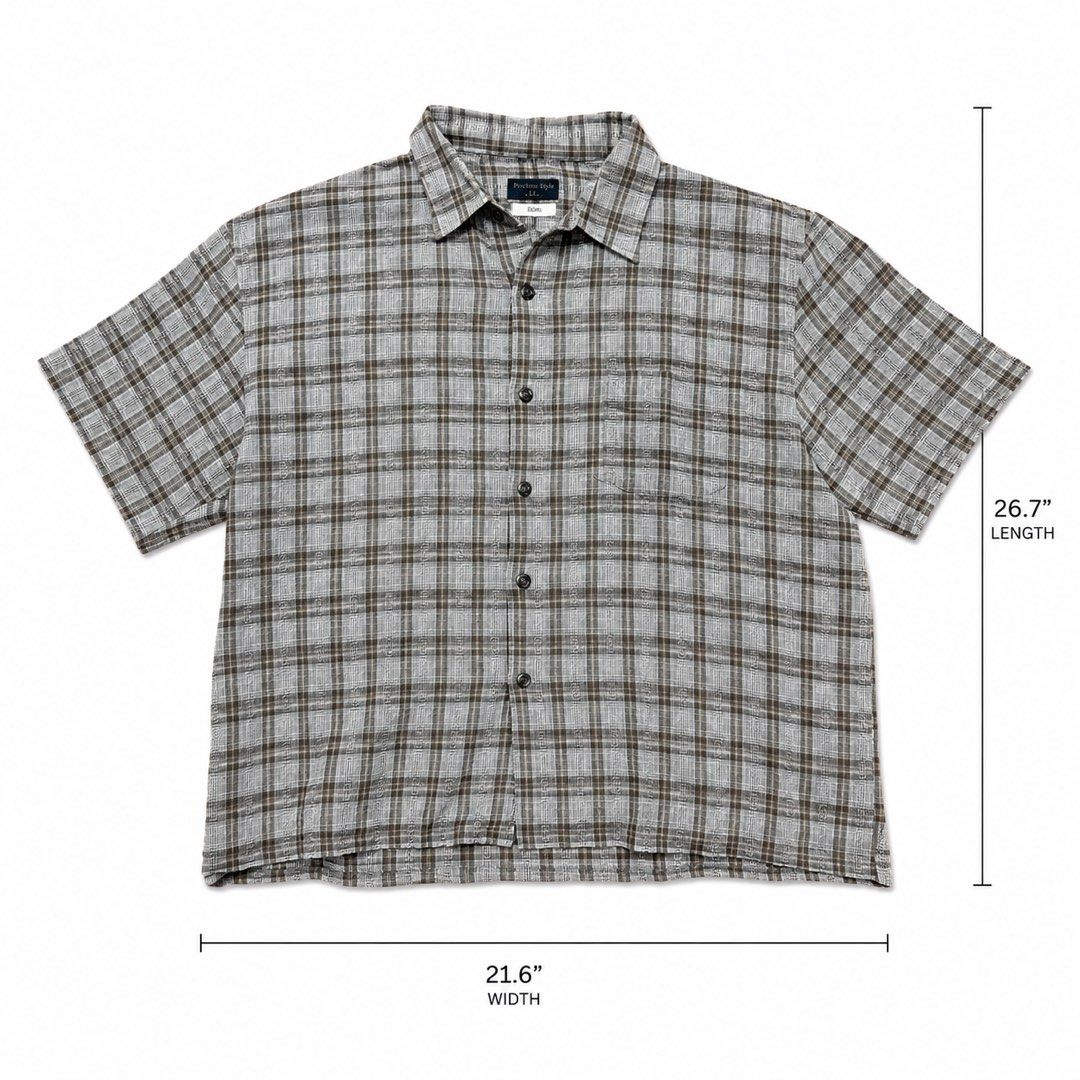 Cropped Linen Plaid Polo Shirt (Category: Tshirts & Polo Shirts ) located in Manila. Submitted by flowww2121 (Listing ID 1449108148, Image 1). Description: - Brown plaid short sleeve shirt - Button-up front - Single chest pocket - Ideal for casual wear - Cropped Style - Linen texture Large but can fit to XL Length: 26.7 inches Width: 22 inches.