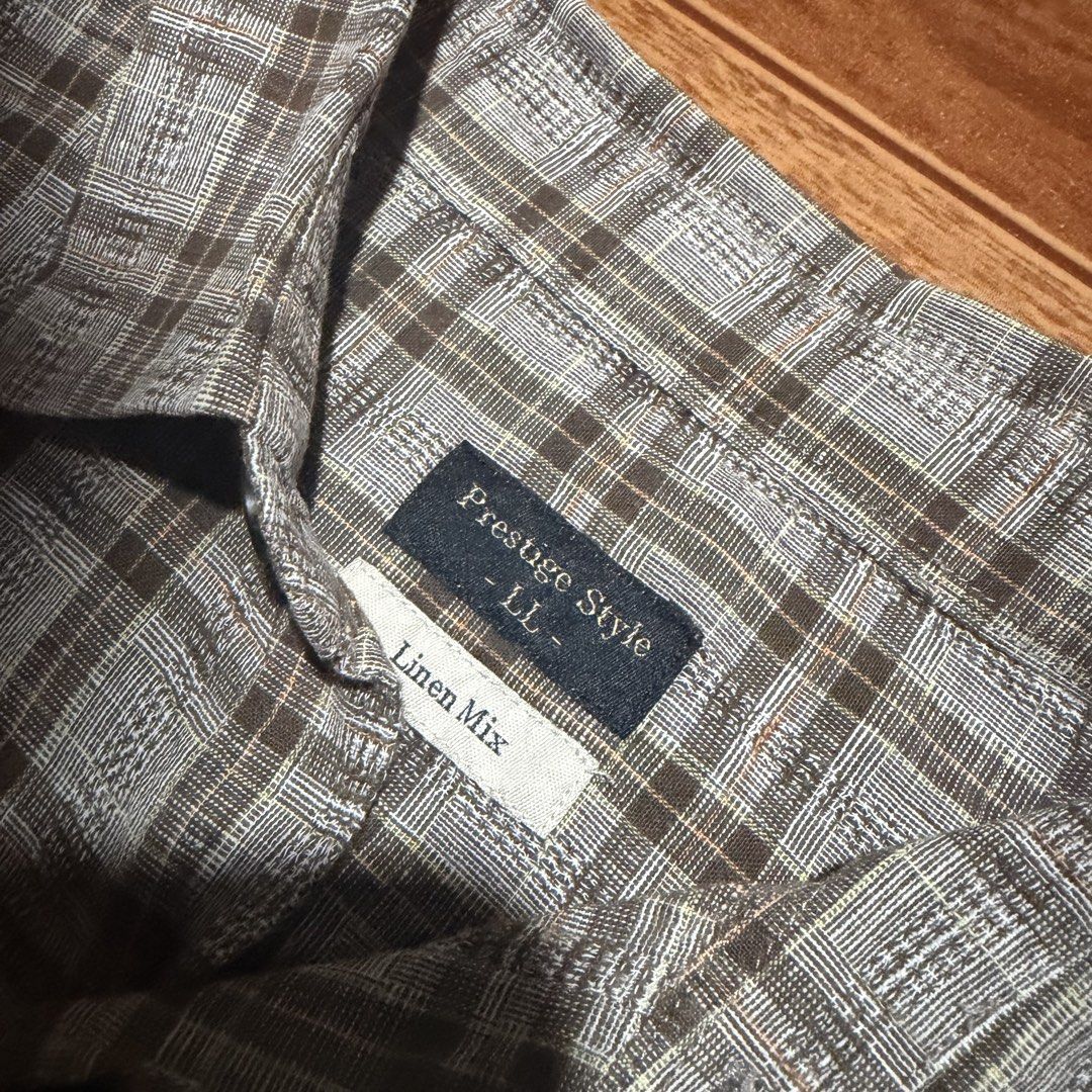 Cropped Linen Plaid Polo Shirt (Category: Tshirts & Polo Shirts ) located in Manila. Submitted by flowww2121 (Listing ID 1449108148, Image 3). Description: - Brown plaid short sleeve shirt - Button-up front - Single chest pocket - Ideal for casual wear - Cropped Style - Linen texture Large but can fit to XL Length: 26.7 inches Width: 22 inches.