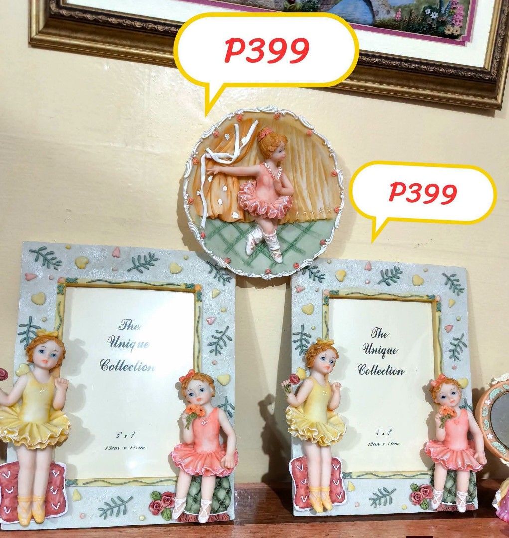 Cute Ballet Figurines Photo Frames Set (Category: Frames & Pictures) located in Quezon City. Submitted by louidanny3 (Listing ID 1449225173, Image 1). Description: - Set includes 2 photo frames and 1 wall decor. - Each item features a cute ballet dancer figurine. - Charming pastel color scheme with delicate floral accents. - Ideal for a little girl's bedroom or any ballet enthusiast. - Price: P399 per item..