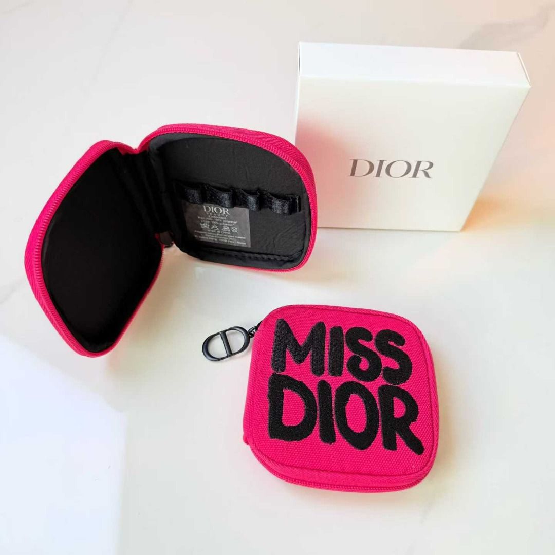 Dior Miss Dior Pink Pouch with Box (Category: Luxury Bags & Wallets) located in Caloocan City. Submitted by refreshmycloset444 (Listing ID 1449154076, Image 2). Description: - Authentic Dior Pouch mini perfume holder Coin purse - Vibrant Bright Pink Color - Features iconic Miss Dior Graphic - Comes with Original Dior Box - Secure Zipper Closure - Interior elastic loops for organizing small essentials With box Brandnew.