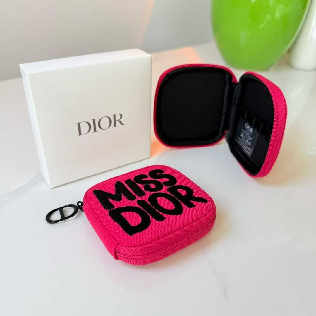 Dior Miss Dior Pink Pouch with Box (Category: Luxury Bags & Wallets) located in Caloocan City. Submitted by refreshmycloset444 (Listing ID 1449154076, Image 3). Description: - Authentic Dior Pouch mini perfume holder Coin purse - Vibrant Bright Pink Color - Features iconic Miss Dior Graphic - Comes with Original Dior Box - Secure Zipper Closure - Interior elastic loops for organizing small essentials With box Brandnew.