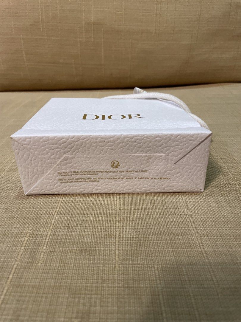 Dior Shopping Bag (Category: Luxury Bags & Wallets) located in Cebu City. Submitted by kiki_closet168 (Listing ID 1449267783, Image 3). Description: - Authentic Dior shopping bag - mini size for makeup - Includes ribbon tie Dimension 5.5in x 5in x 1.75in.