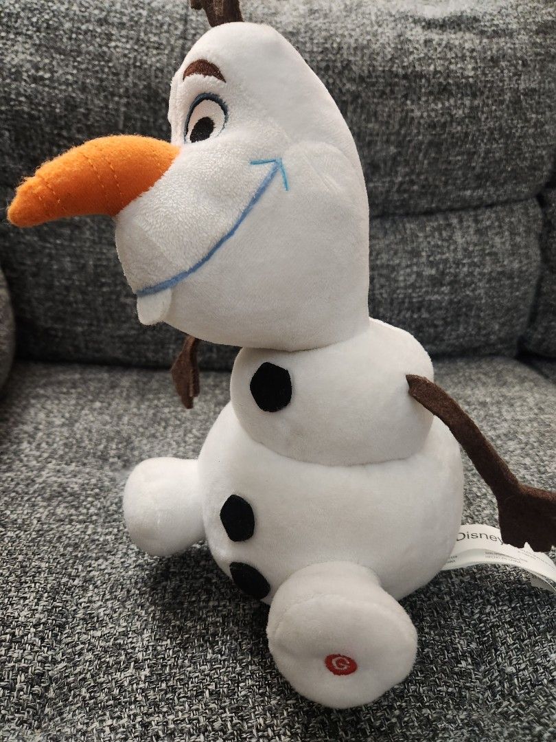 Disney Olaf Dancing Musical Frozen Plush Toy (Category: Toys) located in North York. Submitted by real_reah (Listing ID 1449117798, Image 3). Description: This is a Disney Olaf soft plush toy from Frozen. It's white with his signature orange carrot nose and brown twig arms. It is soft and plush and can also dance when button is pressed. ON/Off button for music is on foot. Music and dancing is battery operated and can be turned on & off. AA Batter