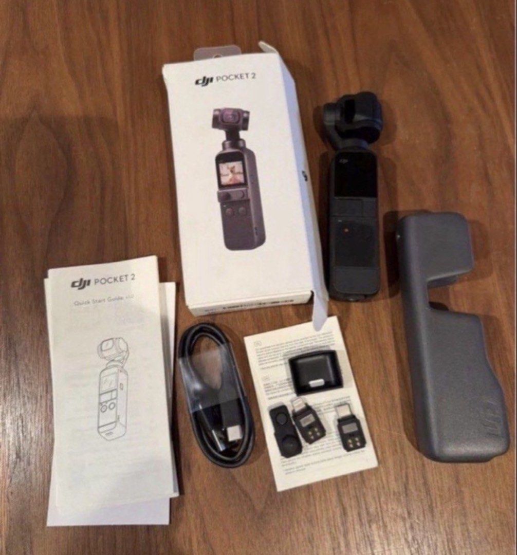 DJI OSMO POCKET 2 CAMCORDER GIMBAL,BLACK-COMPLETE SET (Category: Video Cameras) located in Quezon City. Submitted by carsenmktg (Listing ID 1449160560, Image 2). Description: DJI OSMO POCKET 2 CAMCORDER GIMBAL,BLACK-COMPLETE SET Guaranteed authentic. Bought as a demo unit but still in excellent condition. no deep scratches, no functional defects. complete set in original box. Screen and lens protectors, as well as silicone case since day 1 so act