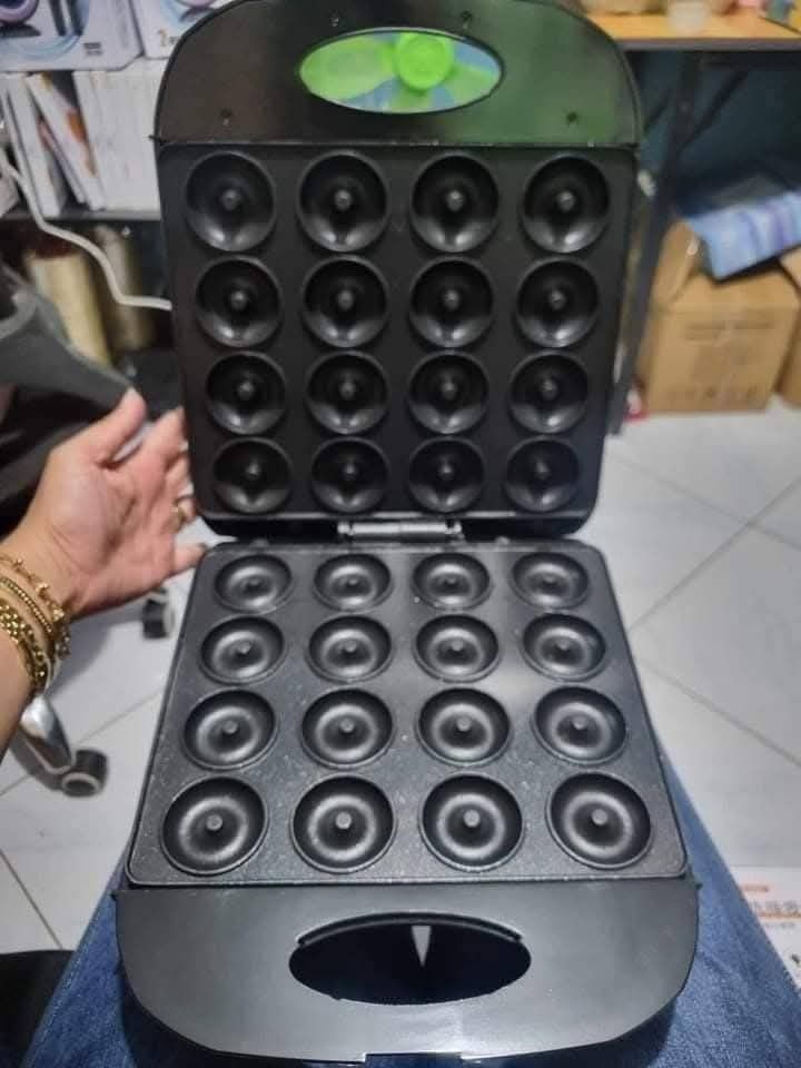 Donut Maker (Category: Other Kitchen Appliances) located in Manila. Submitted by redonline (Listing ID 1449120771, Image 1). Description: Donut Maker 16 Hole ₱1000 On hand Brand New same day delivery COD.