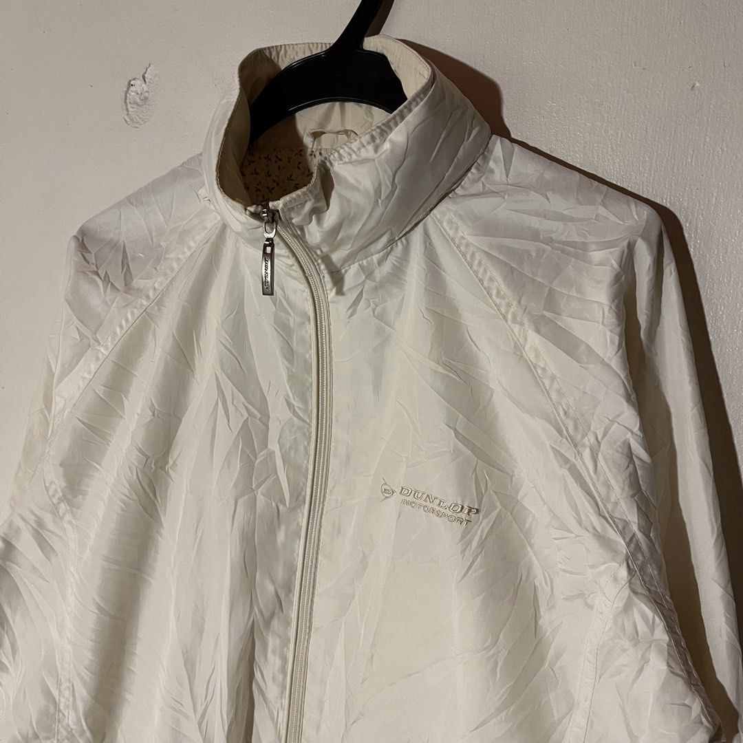 Dunlop | White Windbreaker with Packable Hood (Category: Coats, Jackets and Outerwear) located in Quezon City. Submitted by giometryyy (Listing ID 1449106077, Image 3). Description: W22 L26 Medium excellent condition mesh inner 1 inner chest pocket needs wash 📍Fairview, QC 🛵lalamove/J&T payment first.