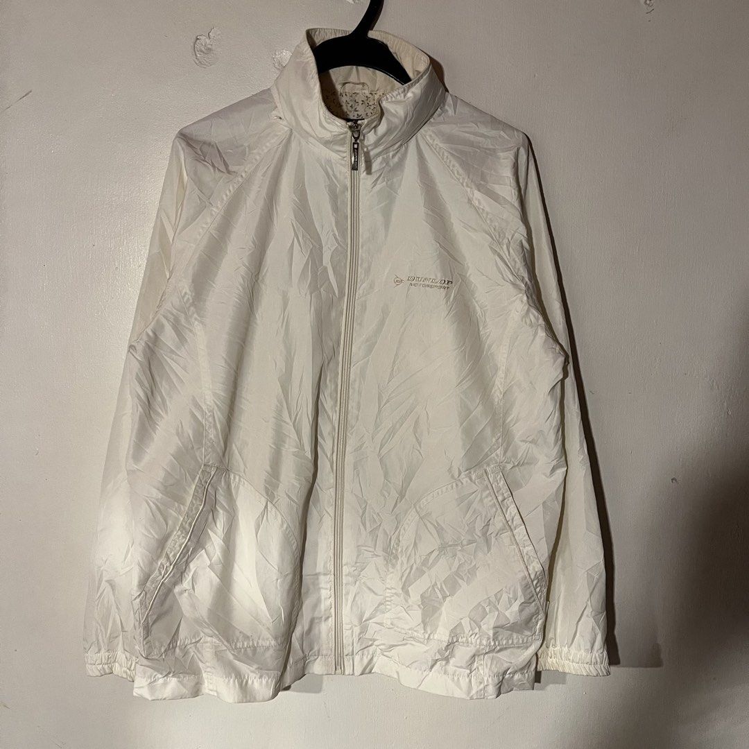 Dunlop | White Windbreaker with Packable Hood (Category: Coats, Jackets and Outerwear) located in Quezon City. Submitted by giometryyy (Listing ID 1449106077, Image 1). Description: W22 L26 Medium excellent condition mesh inner 1 inner chest pocket needs wash 📍Fairview, QC 🛵lalamove/J&T payment first.