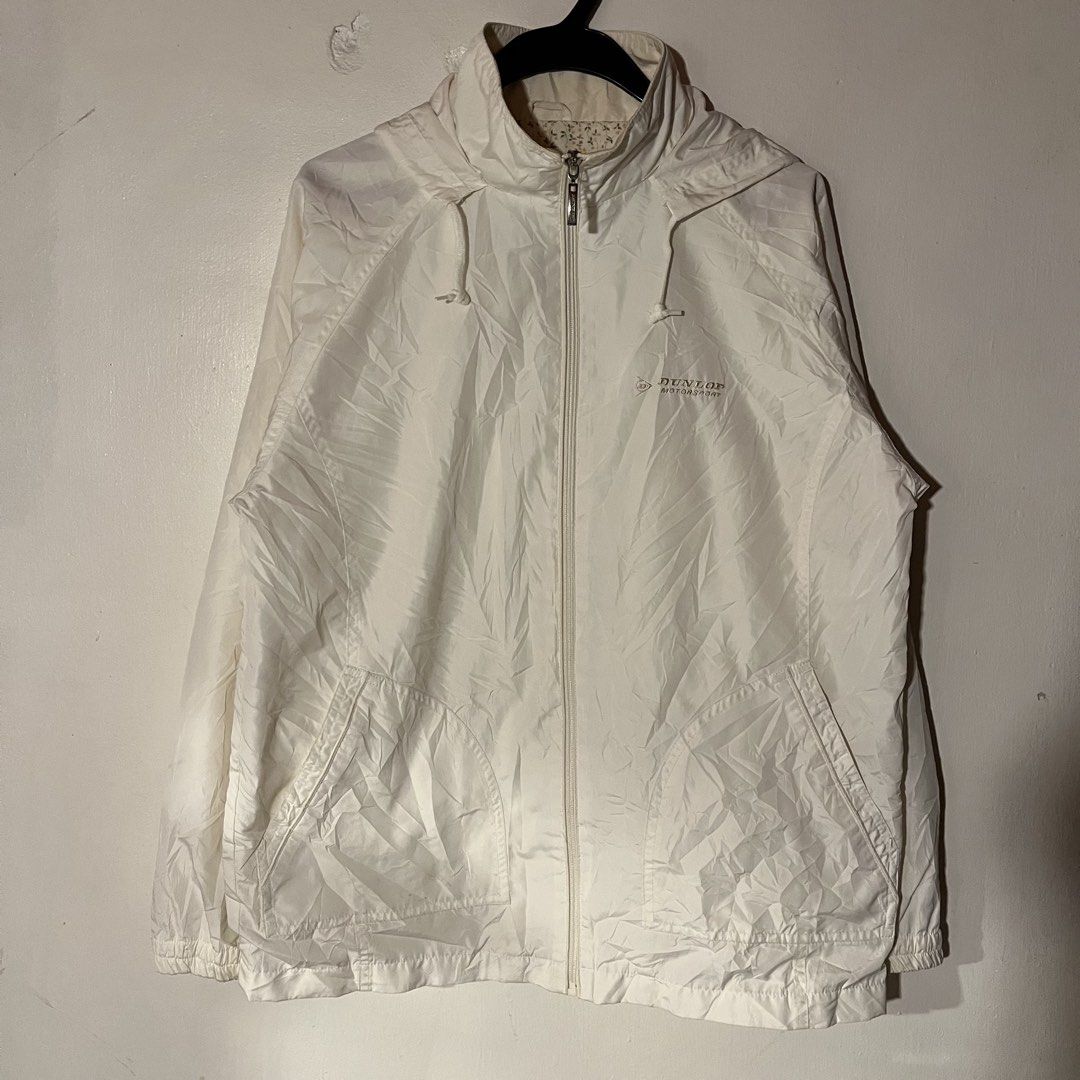 Dunlop | White Windbreaker with Packable Hood (Category: Coats, Jackets and Outerwear) located in Quezon City. Submitted by giometryyy (Listing ID 1449106077, Image 2). Description: W22 L26 Medium excellent condition mesh inner 1 inner chest pocket needs wash 📍Fairview, QC 🛵lalamove/J&T payment first.
